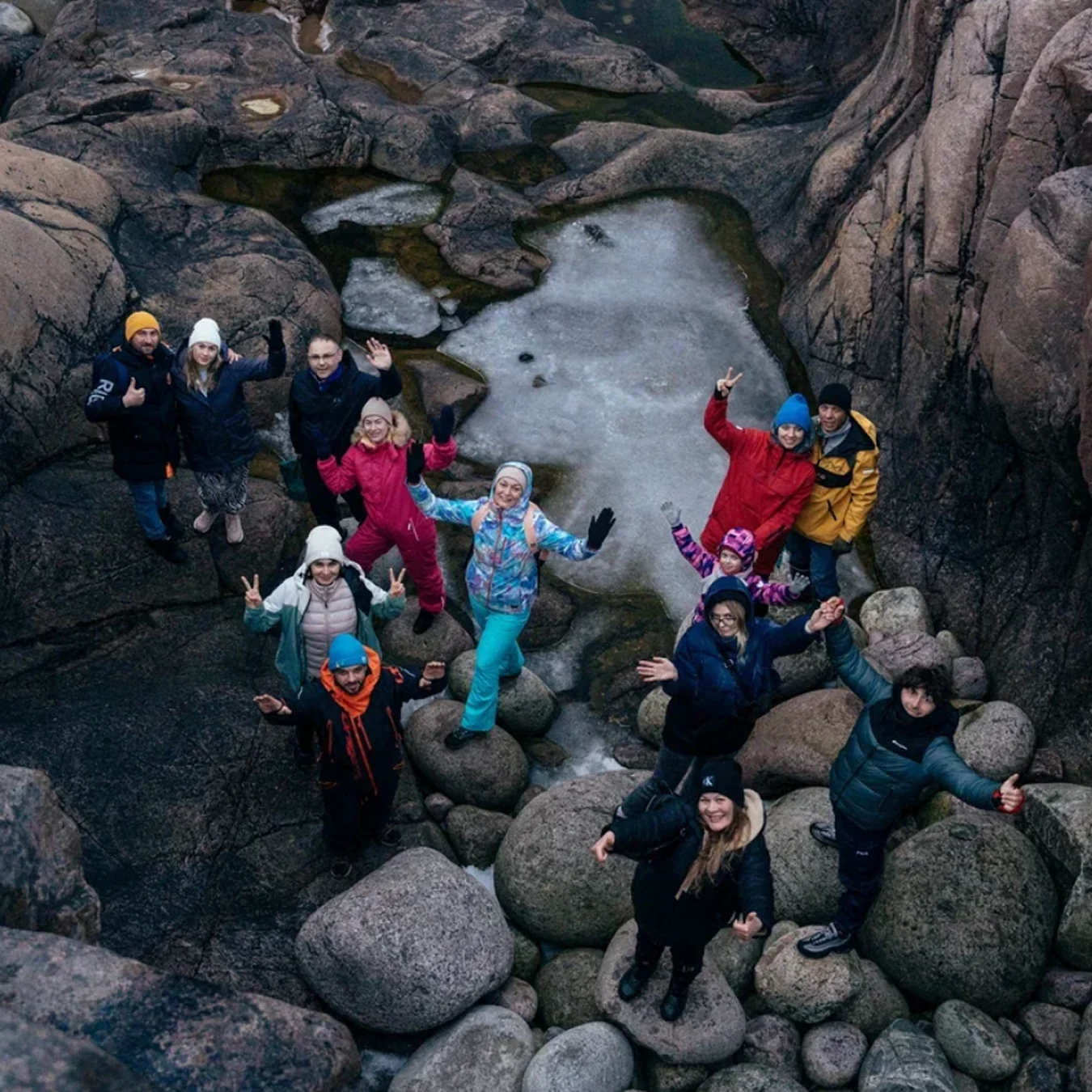 Travellers on the rocky Kola Peninsula coast